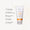 Tube med Green People Scent Free solkrem SPF30 vist med ikoner for produktfordeler og en blomsterillustrasjon.