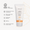 Hvit SPF15 solkremtube med oransje base og grå kork, merket "NATURAL INSECT REPELLENT".