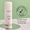 Hvit flaske Green People Scent Free Cleanser på et rundt speil mot en grønn bakgrunn med et dermatologisk testet-segl.